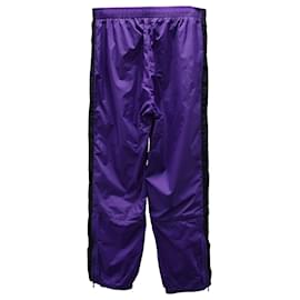 Acne-Pantalones de chándal cónicos en nailon morado a rayas Phoenix de Acne Studios-Púrpura