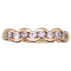 Autre Marque Gold diamond half-turn ring 750%O Gold hardware