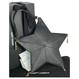 Yves Saint Laurent-Borsa a mano a spalla con stella nappina astro Yves Saint Laurent-Nero
