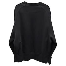 Givenchy-Felpa oversize con dettagli in metallo di Givenchy in cotone nero-Nero