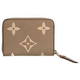 LOUIS VUITTON  Wallets T.  Leather Beige
