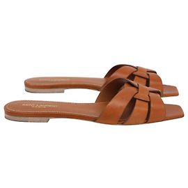 Saint Laurent Flat Tribute Slide Sandalen aus braunem Leder Braun