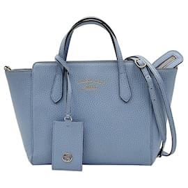 Gucci-Gucci Swing shoulder bag in light blue leather-Light blue