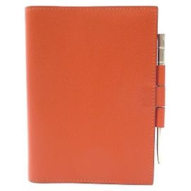 Hermès HERMES TITULAR AGENDA CLEMENCE CAPA DE COURO LARANJA STYLO SILVER MINE BOLSA Laranja