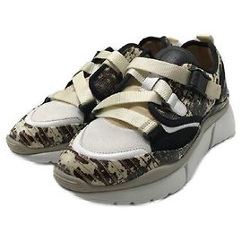 Chloé ****Chloe Sonnie Python zapatillas en relieve Castaño Multicolor