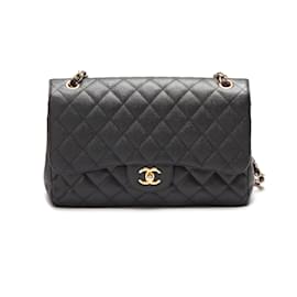 Chanel-Bolsa Caviar Jumbo Classic forrada com aba-Preto