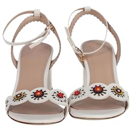 Tory Burch-Tory Burch Cut-Out Floral Appliqué Ankle-Strap Sandals in White Leather-White