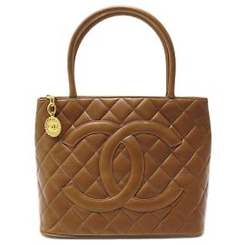 BOLSA DE MÃO DE COURO CHANEL CABAS SHOPPING MEDALHÃO MARROM ACOLCHOADA Marrom