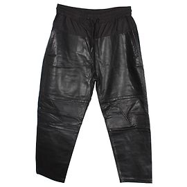 Pantalones jogger con paneles de cuero sintético negro de Alexander Wang x H&M Negro