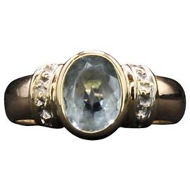 Autre Marque Anillo ovalado de aguamarina engastado en bisel en oro amarillo 18 quilates Azul claro Gold hardware