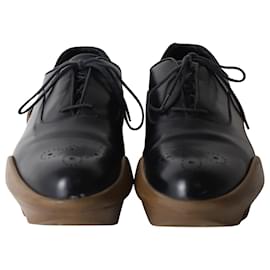 Prada-Zapatos Brogue con plataforma de Prada en cuero negro-Negro