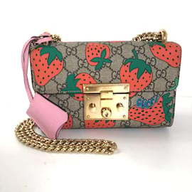 Gucci-Petit sac à bandoulière GG Supreme Strawberry Padlock 409487-Marron