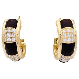 Pendientes boucheron, "El plural", En oro amarillo, diamantes, madera de serpiente. Otro