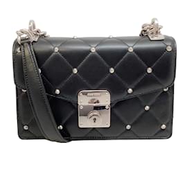 Miu Miu-Borsa a spalla in pelle nera con borchie in nappa di Miu Miu Pattina-Nero