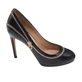 Luxury shoes for women - Salvatore Ferragamo beige leather pumps with black  details