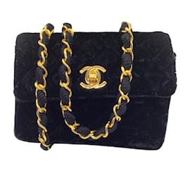 Chanel-Chanel nero vintage 80Mini borsa con patta in velluto trapuntato di-Nero