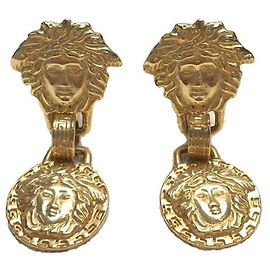 *Pendientes de oro de Gianni Versace Gold hardware