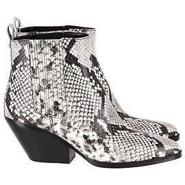 Michael Michael Kors Botines Sinclair de piel con estampado animal Otro Impresión de pitón