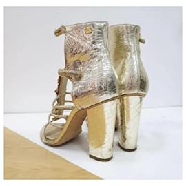 Chanel-Chanel Metallic Gold Textured Leather Camellia Ankle Strap Sandals-Golden