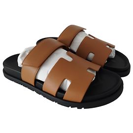 Hermès Sandália Hermes Chipre em couro natural marrom e sola preta Marrom Preto