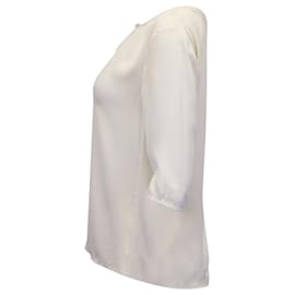Hugo Boss-Blusa de seda crema con cuello de ojo de cerradura y mangas cortas de Hugo Boss-Blanco,Crudo