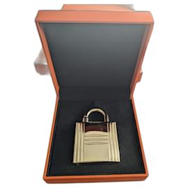 Hermès-Golden perfume padlock-Golden