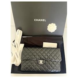 Chanel-CHANEL Timeless Classic Flap bag LARGE In Clutch Format RARE-Black