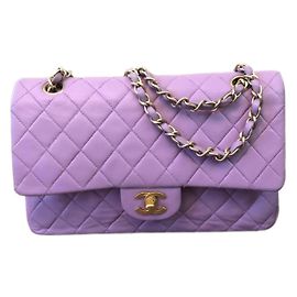 Stunning Chanel Quilted Lambskin Leather Lilac Light Purple Classic Timeless Medium lined Flap Handbag with Matte Gold Champaign Hardware! Purple