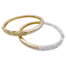 inconnue-Two gold bangle bracelets.-Other