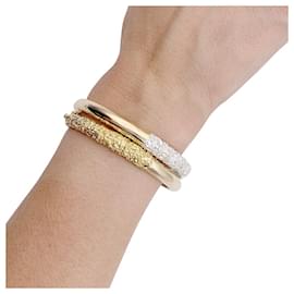 inconnue-Two gold bangle bracelets.-Other