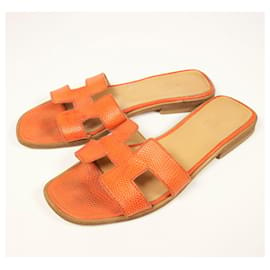 Hermès-Incredibili sandali Hermes Oran in lucertola-Arancione