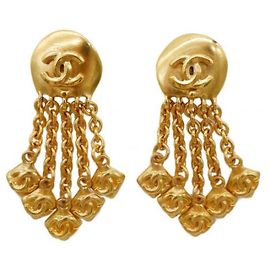 ***Boucles d'oreilles à franges CHANEL coco mark Doré