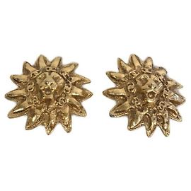 ***Boucles d'oreilles CHANEL motif lion Doré