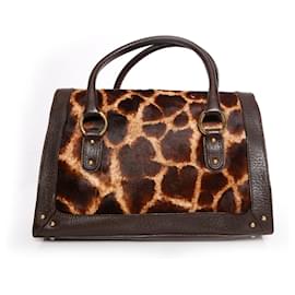 Dolce & Gabbana-DOLCE & GABBANA, Bolso de mano con piel marrón y estampado de jirafas en pelo de ternera..-Castaño