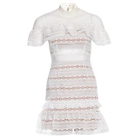 Autre Marque Autoportrait, Mini-robe blanche en dentelle à volants. Blanc