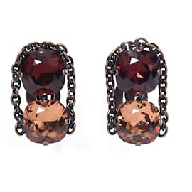 Autre Marque Daniel Swarovski, brown with bronze clip earrings. Brown