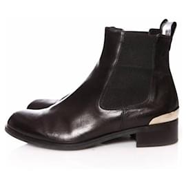 Autre Marque-Russell & Bromley, botas chelsea de couro preto com metal prateado nos saltos em tamanho 36.5.-Preto