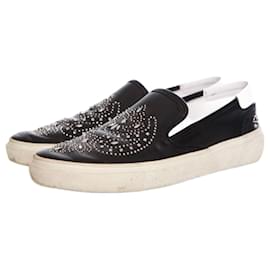 Saint Laurent-SAINT LAURENT, Slip-on-Sneaker aus Leder mit Nieten.-Schwarz