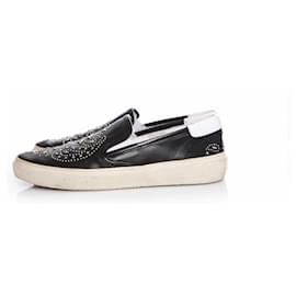 Saint Laurent-SAINT LAURENT, leather slip on sneakers with studs.-Black