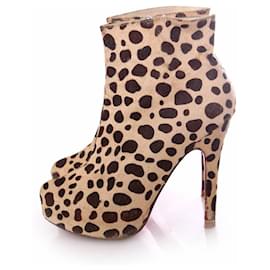 Christian Louboutin-Christian Louboutin, Zapatos de plataforma de piel de potro con estampado de leopardo en talla 39.-Castaño