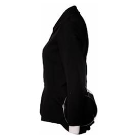 Comme Des Garcons-JUNYA WATANABÉ/COMME DES GARCONS, blazer negro en talla M que se puede convertir en bolso.-Negro
