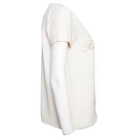 Moschino-MOSCHINO COUTURE, Cream-colored top with gold text.-Other