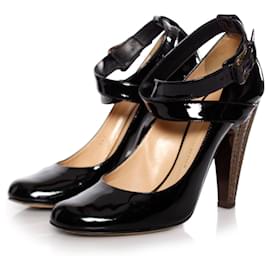 Giuseppe Zanotti-Giuseppe Zanotti, Black patent leather pumps with bronze colored heel in size 39.-Black