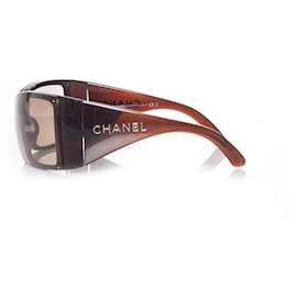 Chanel-Chanel, Brown shield sunglasses.-Other
