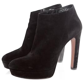 Prada, black suede platform boots. Black