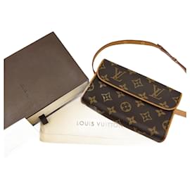 Louis Vuitton-Louis Vuitton Louis Vuitton Florentine clutch bag in monogram canvas-Brown