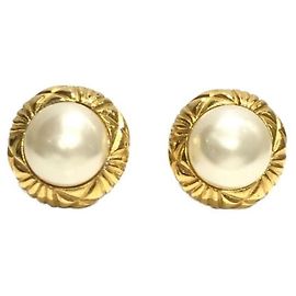 Boucles d'oreilles Chanel dorées Doré