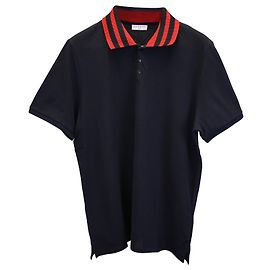 Polo Sandro Paris de algodón negro con cuello a rayas Negro