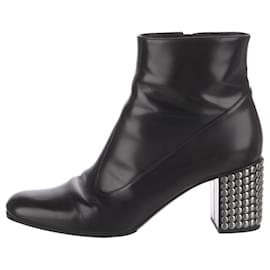 Saint Laurent-calf leather ankle boots with studded heels-Black
