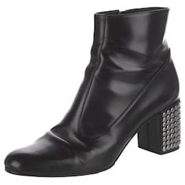 Saint Laurent-calf leather ankle boots with studded heels-Black